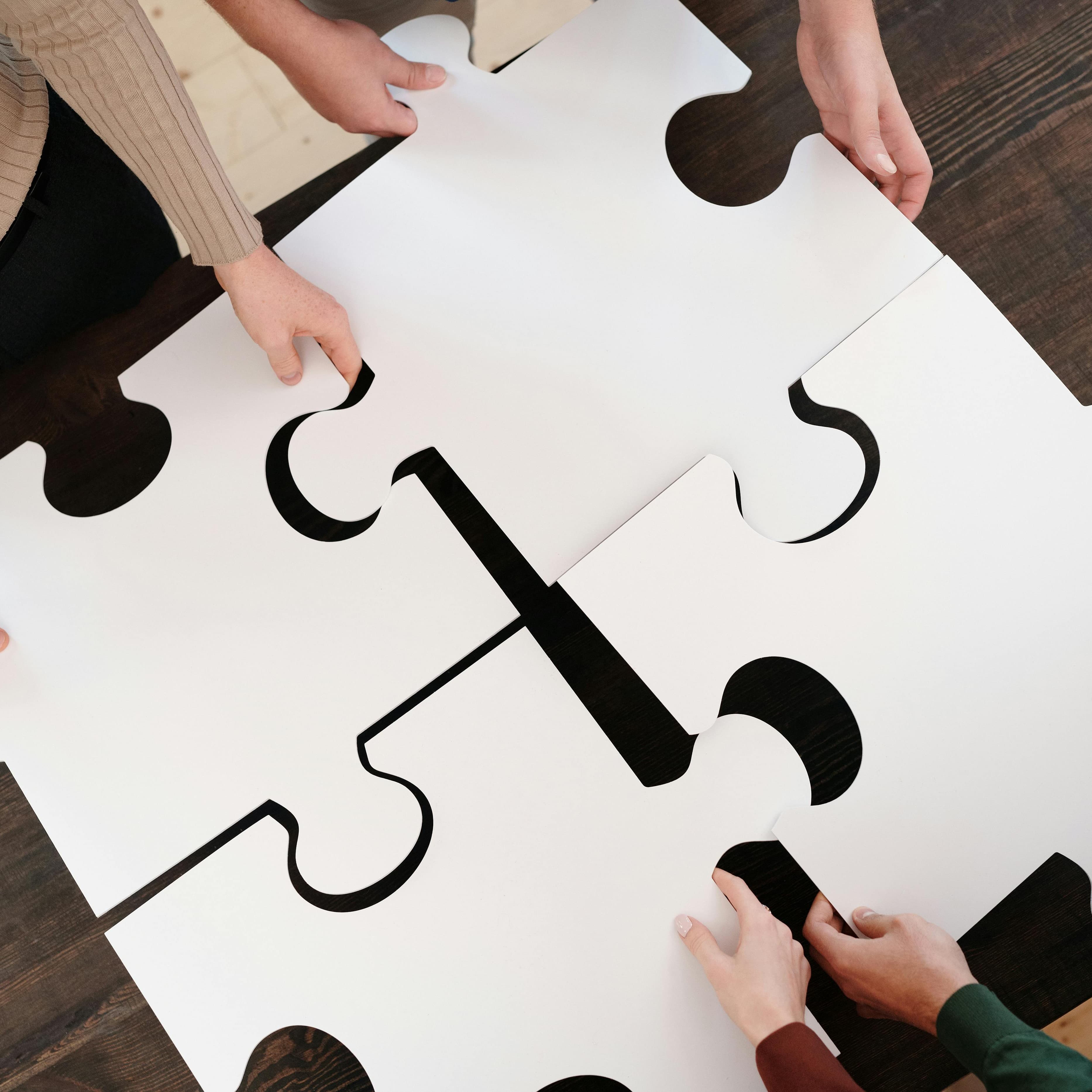 People putting together a giant puzzle.